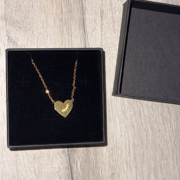 Gold Heart Pendant Necklace With “Ni Modo” written on it - Picture 5 of 6